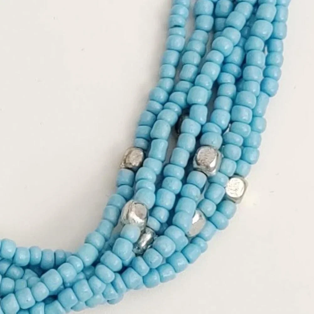 8 strand blue and silver beaded necklace